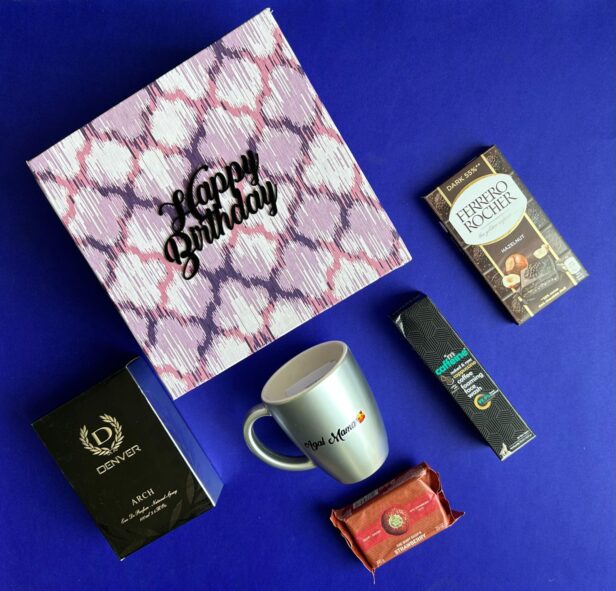 Give a lovely touch to your gifting by sending this amazing combo to your love on his birthday. It has a Fancy Purple box a Bistro mug - 5 Colors, Denver Perfume, mcaffine face wash, The Body Shop Soap and Premium Ferraro Rocher - Hazel Nut