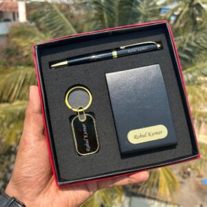 A corporate combo gift typically includes a selection of useful and practical items that can be used in a professional setting. The items you mentioned, a card holder, a pen, and a keychain, are all common choices for corporate gifts.