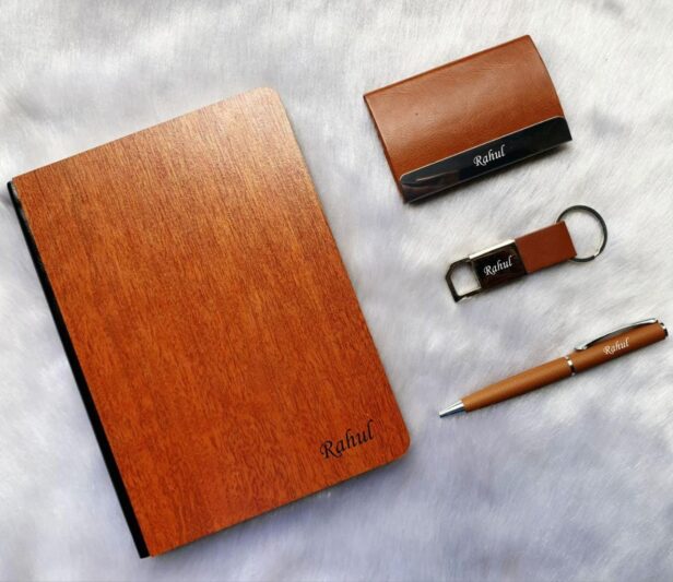 A corporate combo gift typically includes a selection of useful and practical items that can be used in a professional setting. The items you mentioned, a wooden diary, a card holder, a pen, and a keychain, are all common choices for corporate gifts.