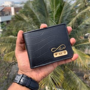 "A stylish and sophisticated accessory, our personalized men's wallet is the epitome of both functionality and individuality. Crafted from high-quality materials, this wallet offers ample storage space for cards, cash, and IDs while exuding a sense of personalized charm. It has 2 cash slots, 5 card Slots and 1 coin pocket.