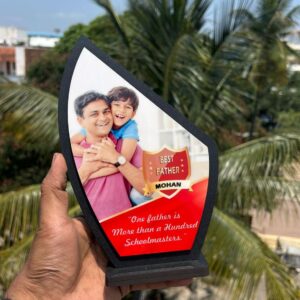 "Presenting the 'World's Greatest Dad' personalized Father's Day trophy, a shining symbol of love and admiration. This beautifully crafted trophy is custom-made to celebrate and honor the incredible contributions and unwavering support of a truly exceptional father.