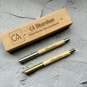 The wooden pen with wooden box for Chartered Accountants (CAs) is a distinguished writing instrument tailored specifically for professionals in the accounting and finance field.