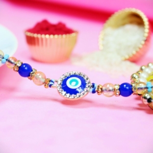 Evil Eye Round Rakhi – Protective Charm Rakhi – Elegant and Stylish Raksha Bandhan Rakhi – Traditional Evil Eye Design