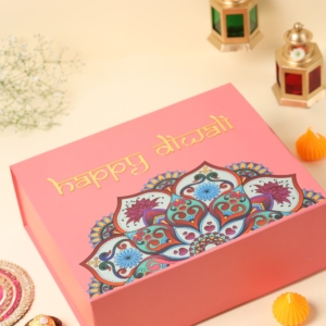 Diwali gift hamper including mini diary, insulated coffee mug, metal pen, Ferrero Rocher chocolates, crystal touch lamp, and personalized Diwali card.