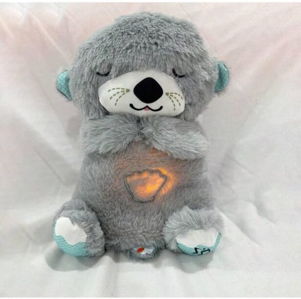 Soft Breathing Teddy plush toy with a heart-shaped glowing light, perfect for bedtime comfort and relaxation for kids.