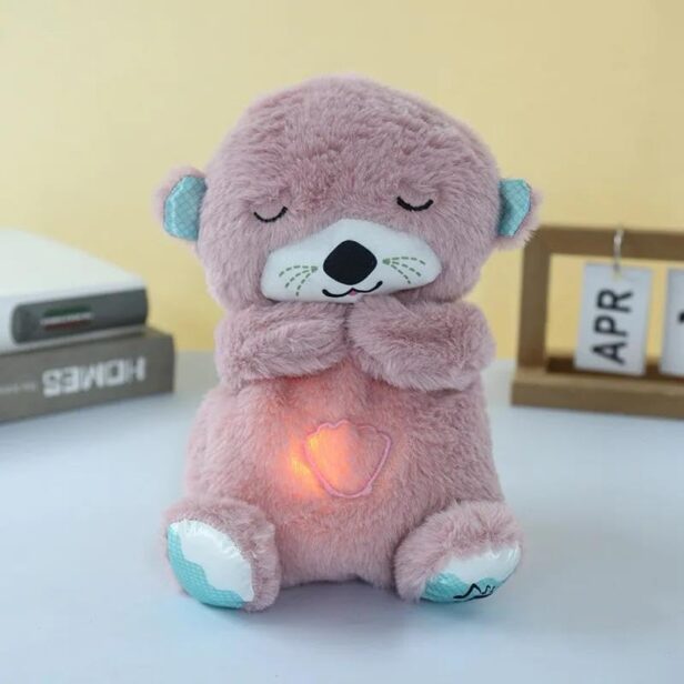 Soft Breathing Teddy plush toy with a heart-shaped glowing light, perfect for bedtime comfort and relaxation for kids.