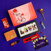 This Beautiful Birthday Gift Hamper Includes a Fancy I Love You Printed box, Saffiona wallet with special name tag, Gold Vector Pen, Drive safe keychain (Brown / Black), a Kitkat , Message bottle, a Gold Rose, Love Frame (4x8 inches) and Birthday greeting card.