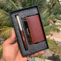 This Premium Corporate Gift Combo includes a selection of useful and practical items that can be used in a professional setting. This Combo includes, a card holder and a pen.