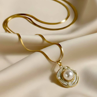 Chunky Gold Plated and White Enamel Swirl Necklace - Quiet Luxury Jewellery