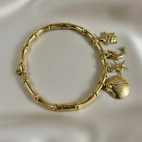 Gold Bamboo Link Charm Bracelet with Ocean Charms