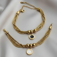 Multi-Strand Gold Bracelet with Two-Sided Roman Numeral Charm