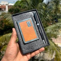 This Premium Corporate Gift Combo includes a selection of useful and practical items that can be used in a professional setting. This Combo includes, a card holder and a pen.