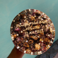 Round resin rose preservation refers to a decorative item that features real rose preserved in resin, encased in a round shape. The resin preserves the natural beauty of the rose and creates a unique and lasting display piece that can be used as a home decor item or a gift for a loved one. 