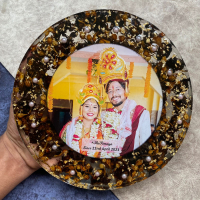 Round resin rose preservation refers to a decorative item that features real rose preserved in resin, encased in a round shape. The resin preserves the natural beauty of the rose and creates a unique and lasting display piece that can be used as a home decor item or a gift for a loved one.