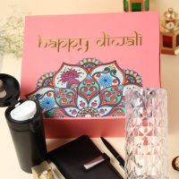 Diwali gift hamper including mini diary, insulated coffee mug, metal pen, Ferrero Rocher chocolates, crystal touch lamp, and personalized Diwali card.